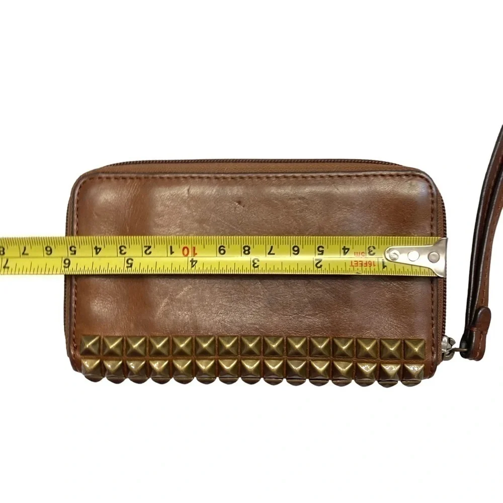 Coach brown weathered leather wristlet wallet